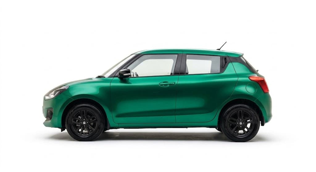 Maruti Swift hatchback parked on a Bengaluru street, real fleet vehicle